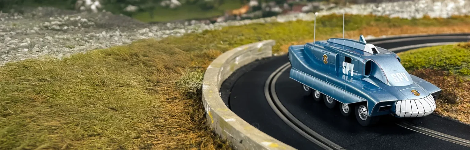 The Thrill of Slot-Car Racing: A Deep Dive into Scalextric C4605 Spectrum Pursuit Vehicle SPV Captain Scarlet HP Banner