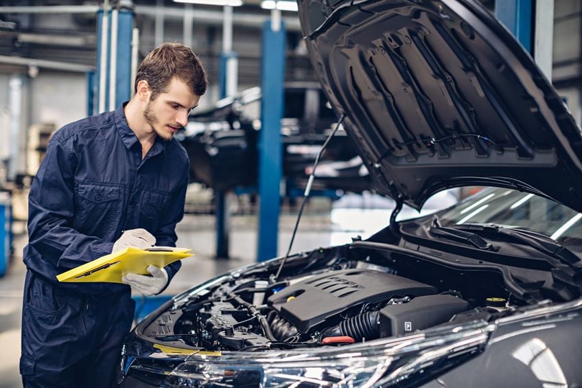 Photo of a mechanic completing a full service on a car (1)